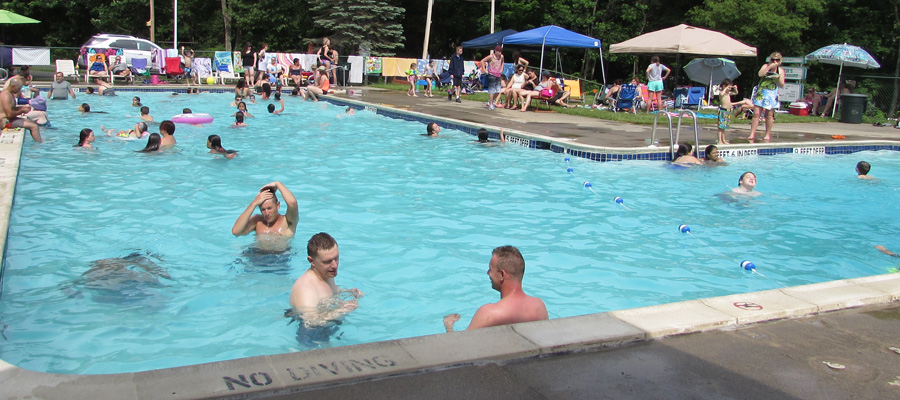 A picture of people enjoying the Kymer's swimming pool