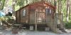 An exterior picture of the front of a cabin available for weekend rental